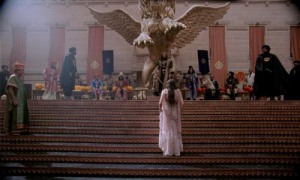 In a tremendous breach of protocol, Queen Esther (Tiffany Dupont) approaches the throne of King Xerxes (Lou Goss).  From the 2006 film One Night with the King (photo:  Box Office Mojo).